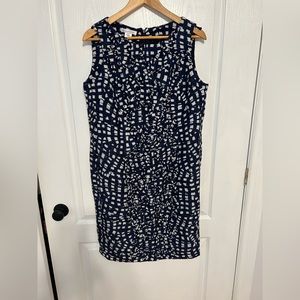 Oscar de la Renta navy and white shift dress with small ruffle panel in front.